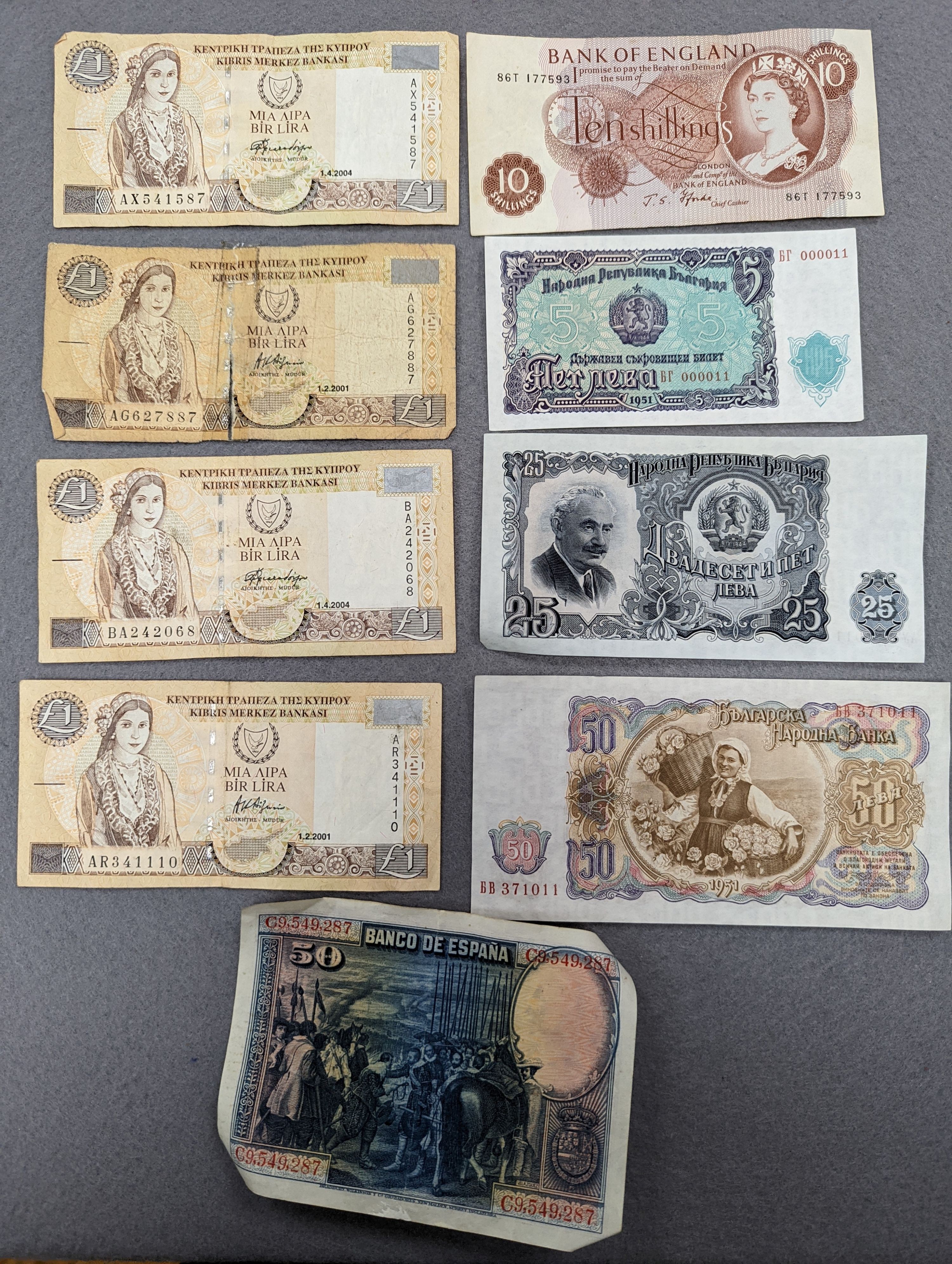 A collection of coins and banknotes